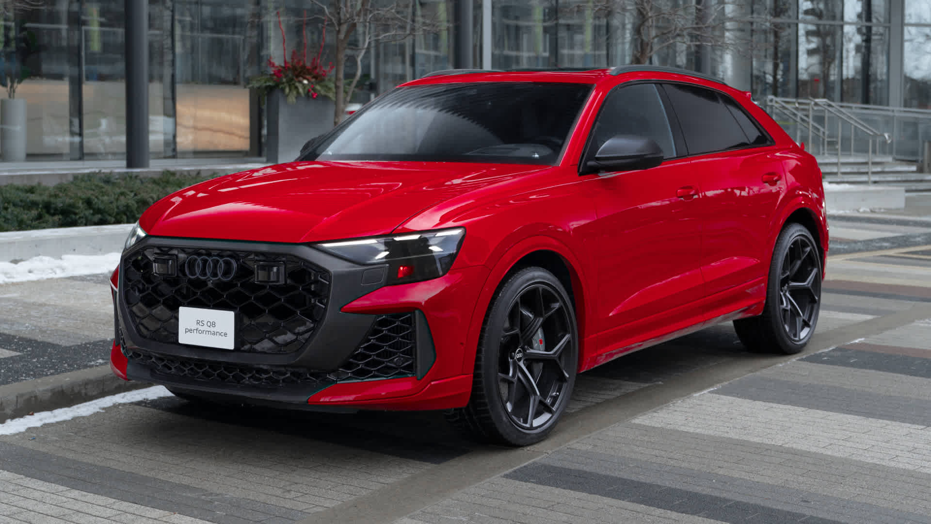 Three quarter right side profile view of an Audi RSQ8 parked.